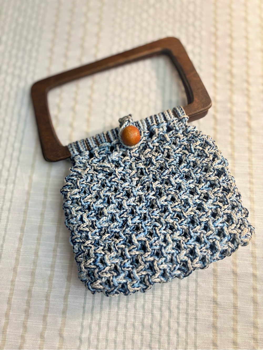 Handcrafted Blue and Cream Crochet Wristlet with Wooden Handle